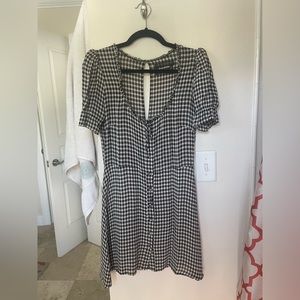 Reformation dress size medium, runs small. Very slimming. Black and white check